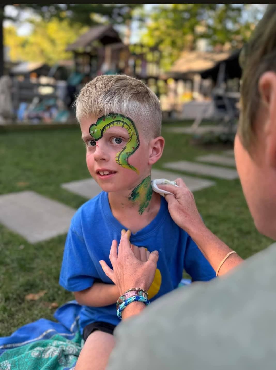 Snake face painting in progress